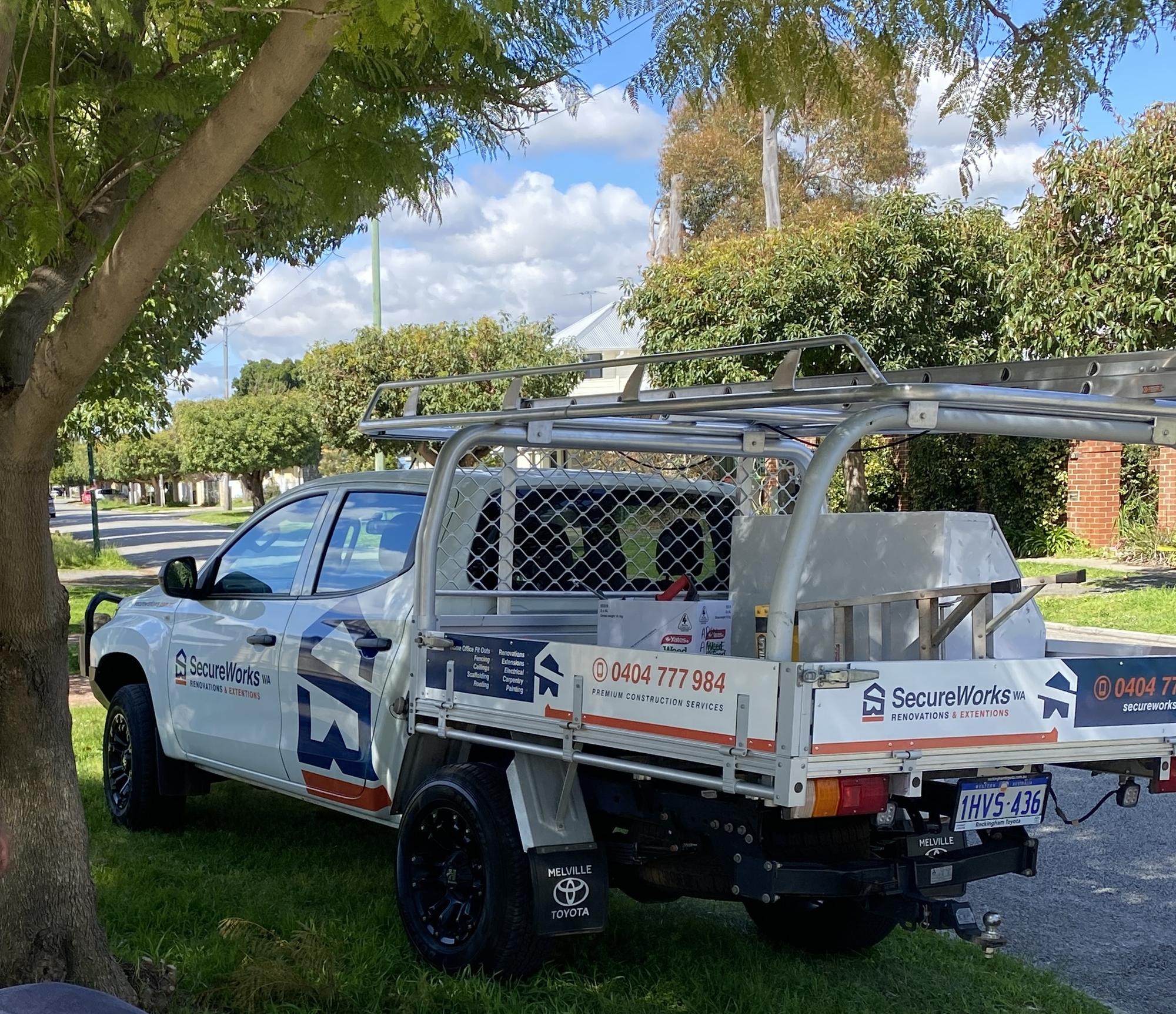 SecureWorks branded vehicle and crew on location