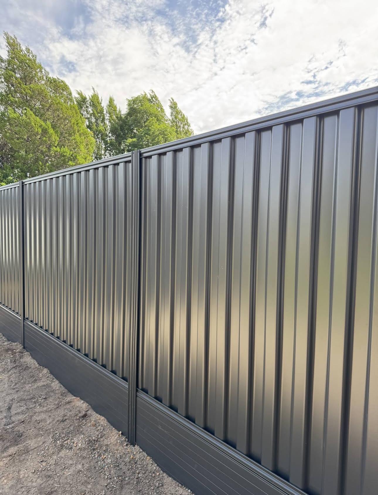 Colorbond steel fence installation by SecureWorks crew