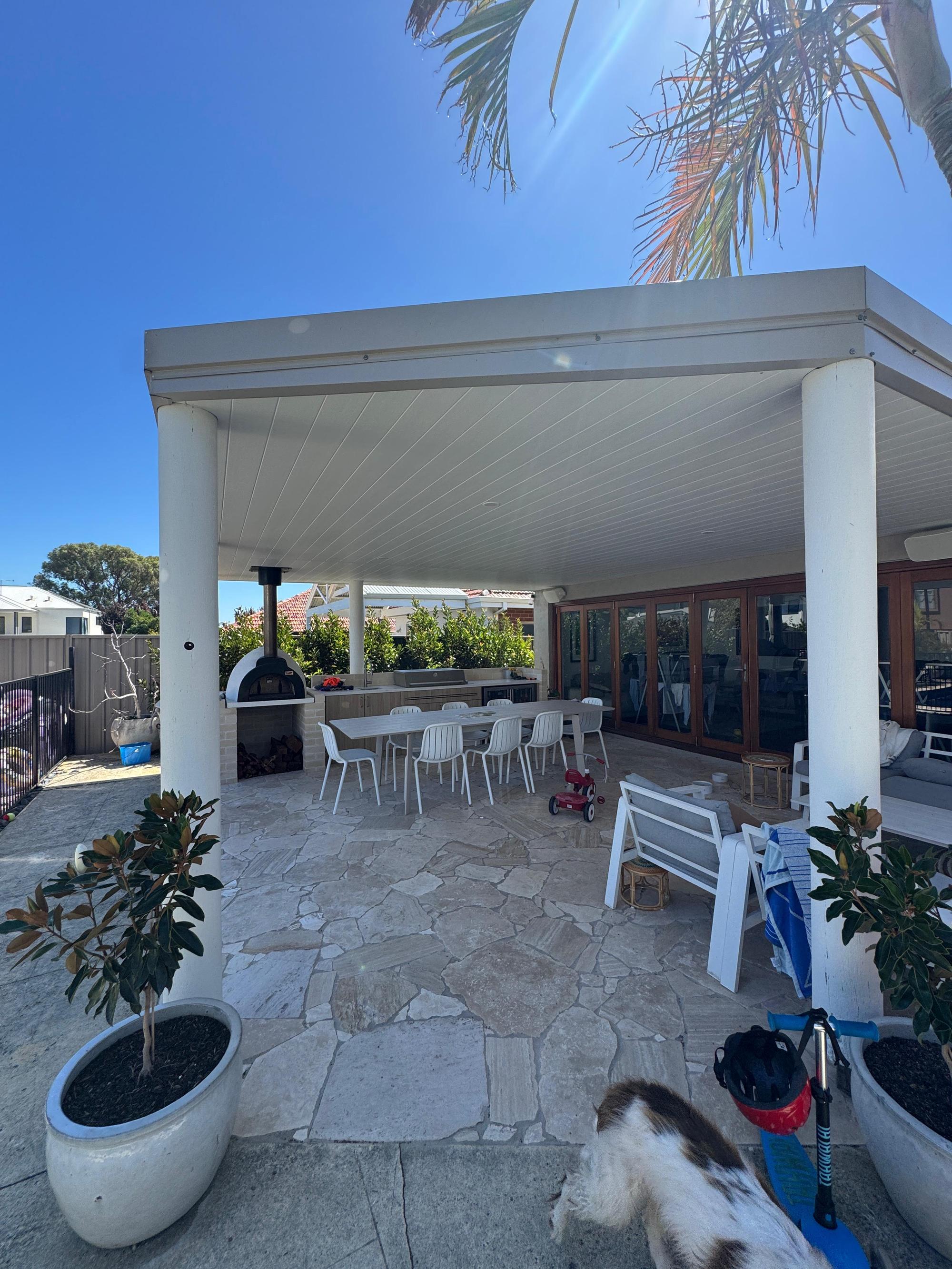 Complete backyard transformation with freestanding patio and outdoor kitchen in Stirling